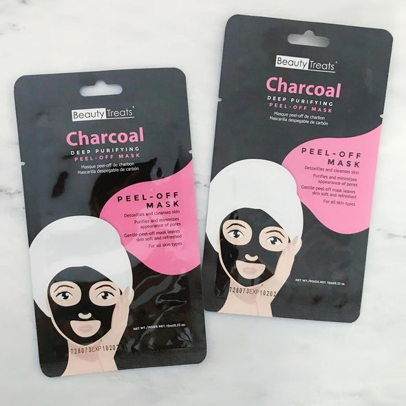 Image of two packs of Beauty Treats' Peel-Off Charcoal Facial Mask with a gray background.